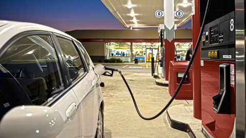 Refueling Automobile At Gas Station Convenience Store
